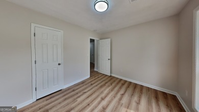 This renovated 3 bedroom, 2 bathroom home offers modern living on Mystery Valley Golf Course in Georgia - for sale on GolfHomes.com, golf home, golf lot