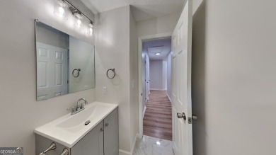 This renovated 3 bedroom, 2 bathroom home offers modern living on Mystery Valley Golf Course in Georgia - for sale on GolfHomes.com, golf home, golf lot