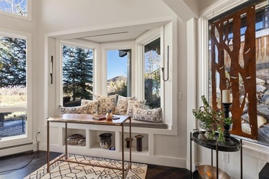 Tucked at the end of a cul-de-sac, this private townhome on Rollingstone Ranch Golf Club in Colorado - for sale on GolfHomes.com, golf home, golf lot