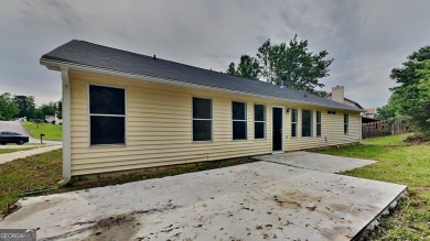 This renovated 3 bedroom, 2 bathroom home offers modern living on Mystery Valley Golf Course in Georgia - for sale on GolfHomes.com, golf home, golf lot