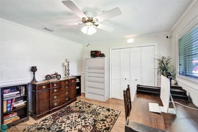 Live in a beautiful golf community without the membership fees! on Country Club of Coral Springs in Florida - for sale on GolfHomes.com, golf home, golf lot
