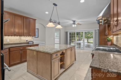 Nestled in a highly desirable neighborhood near Lake Norman on Cowans Ford Country Club in North Carolina - for sale on GolfHomes.com, golf home, golf lot