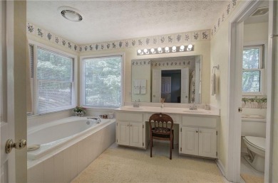 Step into this inviting ranch-style home, filled with natural on Bent Tree Golf Course in Georgia - for sale on GolfHomes.com, golf home, golf lot