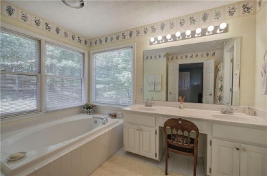 Step into this inviting ranch-style home, filled with natural on Bent Tree Golf Course in Georgia - for sale on GolfHomes.com, golf home, golf lot