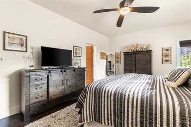 Tucked at the end of a cul-de-sac, this private townhome on Rollingstone Ranch Golf Club in Colorado - for sale on GolfHomes.com, golf home, golf lot