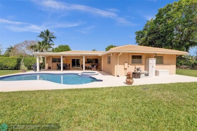Live in a beautiful golf community without the membership fees! on Country Club of Coral Springs in Florida - for sale on GolfHomes.com, golf home, golf lot