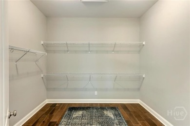Welcome to this spacious move-in ready home that shows like a on Savannah Quarters Country Club in Georgia - for sale on GolfHomes.com, golf home, golf lot