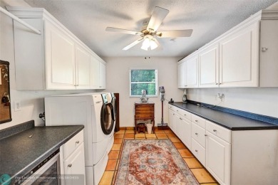 Live in a beautiful golf community without the membership fees! on Country Club of Coral Springs in Florida - for sale on GolfHomes.com, golf home, golf lot