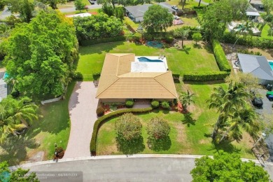 Live in a beautiful golf community without the membership fees! on Country Club of Coral Springs in Florida - for sale on GolfHomes.com, golf home, golf lot