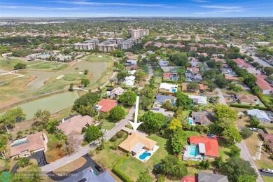 Live in a beautiful golf community without the membership fees! on Country Club of Coral Springs in Florida - for sale on GolfHomes.com, golf home, golf lot