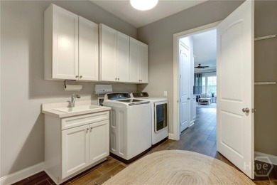 Welcome to this spacious move-in ready home that shows like a on Savannah Quarters Country Club in Georgia - for sale on GolfHomes.com, golf home, golf lot