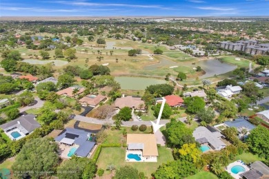 Live in a beautiful golf community without the membership fees! on Country Club of Coral Springs in Florida - for sale on GolfHomes.com, golf home, golf lot
