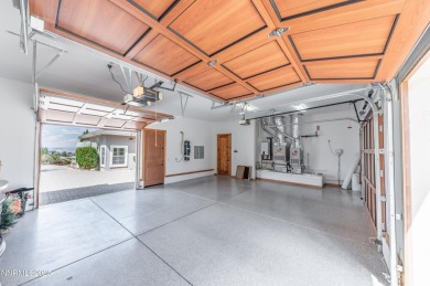 Located at the end of a secluded cul-de-sac in the exclusive on  in Nevada - for sale on GolfHomes.com, golf home, golf lot