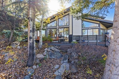 Tucked at the end of a cul-de-sac, this private townhome on Rollingstone Ranch Golf Club in Colorado - for sale on GolfHomes.com, golf home, golf lot