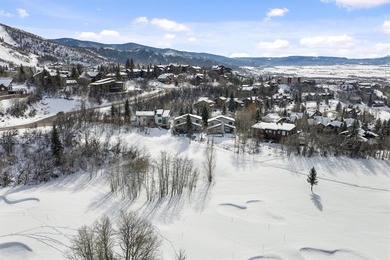 Tucked at the end of a cul-de-sac, this private townhome on Rollingstone Ranch Golf Club in Colorado - for sale on GolfHomes.com, golf home, golf lot