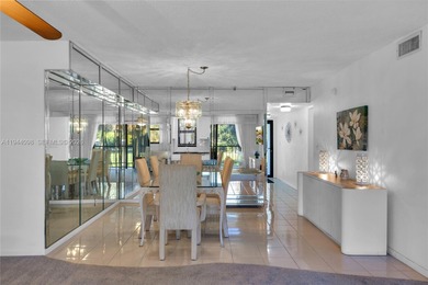 Excellent opportunity to live in the beautiful Palms Tower II on Deer Creek Golf Club in Florida - for sale on GolfHomes.com, golf home, golf lot