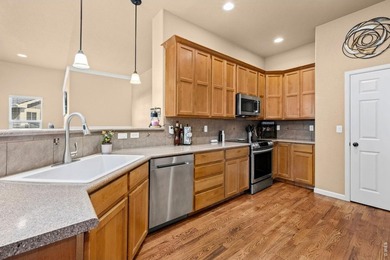 Welcome home to Water Valley! This beautiful ranch-style on Pelican Lakes Golf and Country Club in Colorado - for sale on GolfHomes.com, golf home, golf lot