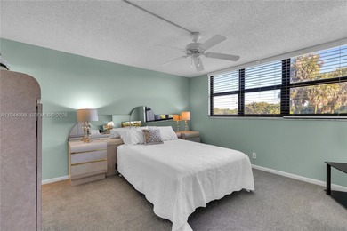 Excellent opportunity to live in the beautiful Palms Tower II on Deer Creek Golf Club in Florida - for sale on GolfHomes.com, golf home, golf lot