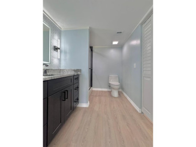 SPECTACULAR! Don't miss this MOVE-IN READY, COMPLETELY REMODELED on Bear Lakes Country Club in Florida - for sale on GolfHomes.com, golf home, golf lot