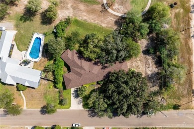 Looking for the perfect hidden gem? This charming 4 Bed / 4 Bath on Shary Municipal Golf Course in Texas - for sale on GolfHomes.com, golf home, golf lot