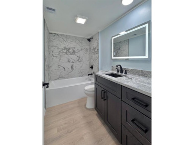 SPECTACULAR! Don't miss this MOVE-IN READY, COMPLETELY REMODELED on Bear Lakes Country Club in Florida - for sale on GolfHomes.com, golf home, golf lot