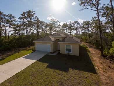 Welcome to 6730 Orlando Drive -- Where Relaxed Country Living on Indian Lake Estates Golf and Country Club in Florida - for sale on GolfHomes.com, golf home, golf lot
