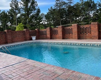 Nationally recognized Donald Gardner Design of the Year (2000) on Caswell Pines Golf Club in North Carolina - for sale on GolfHomes.com, golf home, golf lot