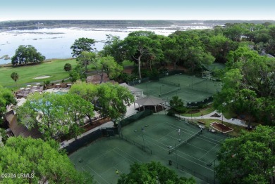 Nestled within the serene confines of Dataw Island is an open on Dataw Island Club in South Carolina - for sale on GolfHomes.com, golf home, golf lot