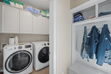 Life grows beautifully at 490 Bear Tree, where timeless elegance on The Preserve At Jordan Lake Golf Club in North Carolina - for sale on GolfHomes.com, golf home, golf lot