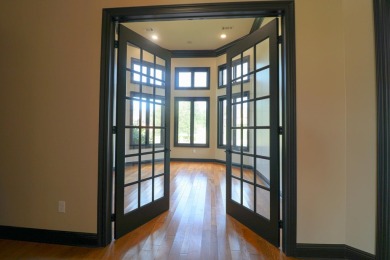 This stunning all-brick home, has been completely remodeled to on RidgePointe Country Club in Arkansas - for sale on GolfHomes.com, golf home, golf lot