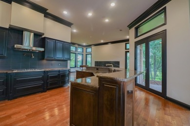 This stunning all-brick home, has been completely remodeled to on RidgePointe Country Club in Arkansas - for sale on GolfHomes.com, golf home, golf lot