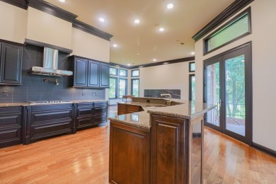 This stunning all-brick home, has been completely remodeled to on RidgePointe Country Club in Arkansas - for sale on GolfHomes.com, golf home, golf lot