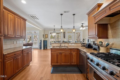 Life grows beautifully at 490 Bear Tree, where timeless elegance on The Preserve At Jordan Lake Golf Club in North Carolina - for sale on GolfHomes.com, golf home, golf lot