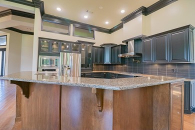 This stunning all-brick home, has been completely remodeled to on RidgePointe Country Club in Arkansas - for sale on GolfHomes.com, golf home, golf lot