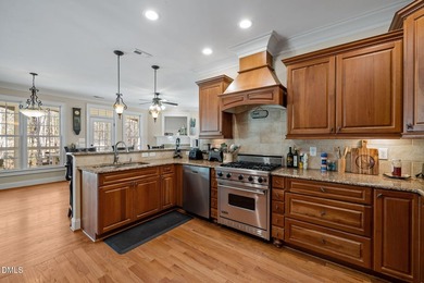 Life grows beautifully at 490 Bear Tree, where timeless elegance on The Preserve At Jordan Lake Golf Club in North Carolina - for sale on GolfHomes.com, golf home, golf lot