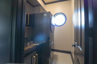 This stunning all-brick home, has been completely remodeled to on RidgePointe Country Club in Arkansas - for sale on GolfHomes.com, golf home, golf lot