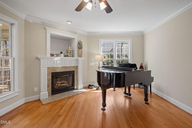 Life grows beautifully at 490 Bear Tree, where timeless elegance on The Preserve At Jordan Lake Golf Club in North Carolina - for sale on GolfHomes.com, golf home, golf lot