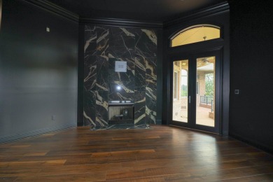 This stunning all-brick home, has been completely remodeled to on RidgePointe Country Club in Arkansas - for sale on GolfHomes.com, golf home, golf lot