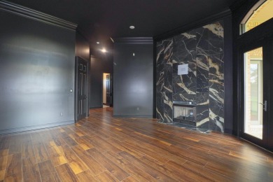 This stunning all-brick home, has been completely remodeled to on RidgePointe Country Club in Arkansas - for sale on GolfHomes.com, golf home, golf lot