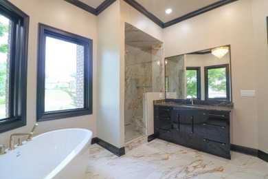 This stunning all-brick home, has been completely remodeled to on RidgePointe Country Club in Arkansas - for sale on GolfHomes.com, golf home, golf lot
