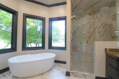 This stunning all-brick home, has been completely remodeled to on RidgePointe Country Club in Arkansas - for sale on GolfHomes.com, golf home, golf lot