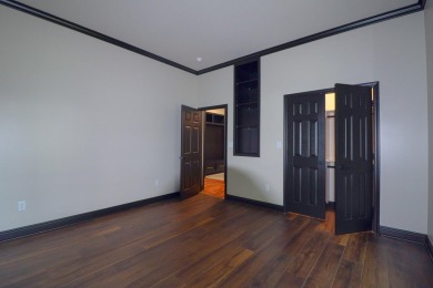 This stunning all-brick home, has been completely remodeled to on RidgePointe Country Club in Arkansas - for sale on GolfHomes.com, golf home, golf lot
