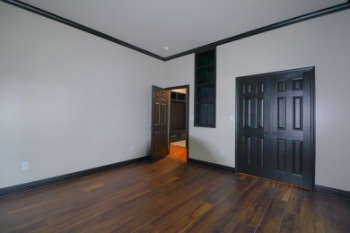 This stunning all-brick home, has been completely remodeled to on RidgePointe Country Club in Arkansas - for sale on GolfHomes.com, golf home, golf lot