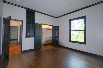 This stunning all-brick home, has been completely remodeled to on RidgePointe Country Club in Arkansas - for sale on GolfHomes.com, golf home, golf lot