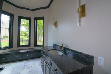 This stunning all-brick home, has been completely remodeled to on RidgePointe Country Club in Arkansas - for sale on GolfHomes.com, golf home, golf lot