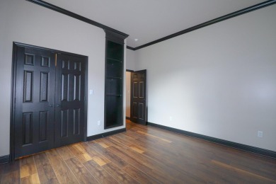 This stunning all-brick home, has been completely remodeled to on RidgePointe Country Club in Arkansas - for sale on GolfHomes.com, golf home, golf lot