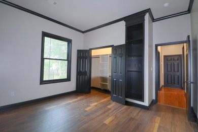 This stunning all-brick home, has been completely remodeled to on RidgePointe Country Club in Arkansas - for sale on GolfHomes.com, golf home, golf lot