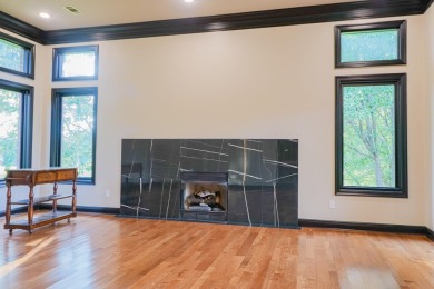 This stunning all-brick home, has been completely remodeled to on RidgePointe Country Club in Arkansas - for sale on GolfHomes.com, golf home, golf lot