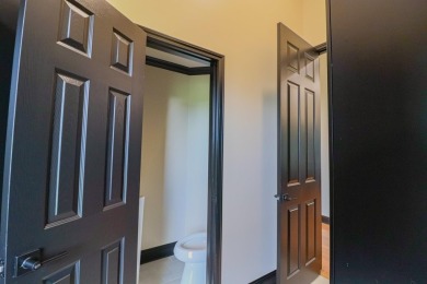 This stunning all-brick home, has been completely remodeled to on RidgePointe Country Club in Arkansas - for sale on GolfHomes.com, golf home, golf lot