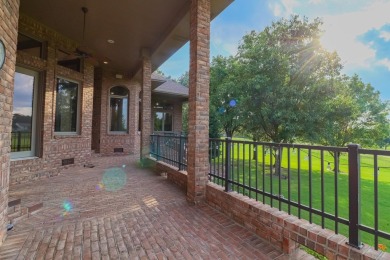 This stunning all-brick home, has been completely remodeled to on RidgePointe Country Club in Arkansas - for sale on GolfHomes.com, golf home, golf lot